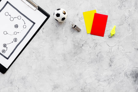 Sport judging concept. Soccer referee. Tactic plan for game, football ball, red and yellow cards,...