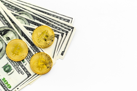 Bitcoin with international currency banknotes on white background top view space for textの写真素材