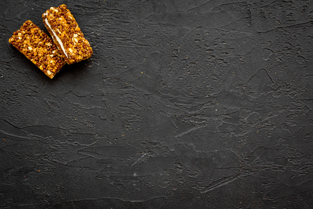 Sport bars for fast energy. Black background top view copy spaceの写真素材