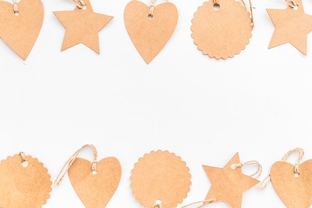 Figured blank tags for write price or discount on white background space for text mockupの写真素材