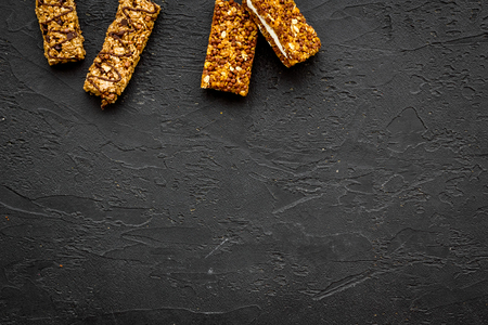 Sport bars for fast energy. Black background top view copy spaceの写真素材