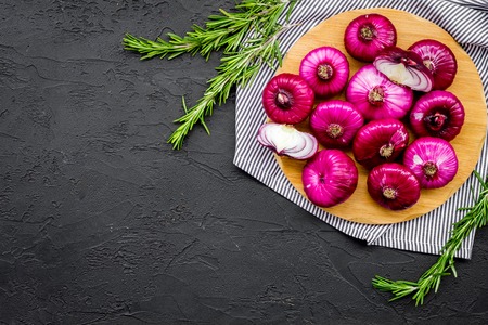 Red onion for salads on black background top view.の写真素材