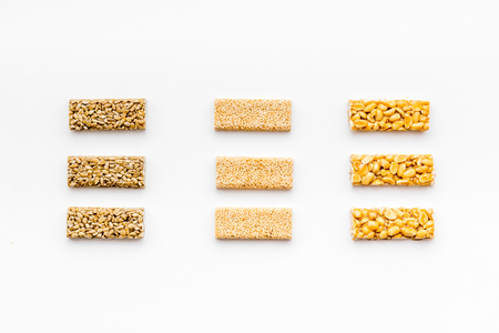 Sport bars for fast energy. White background top view patternの写真素材