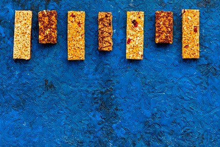 Sport bars for fast energy. Blue background top view copy spaceの写真素材