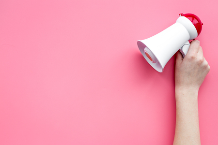 Attract attention concept. Megaphone in hand top view copy spaceの写真素材