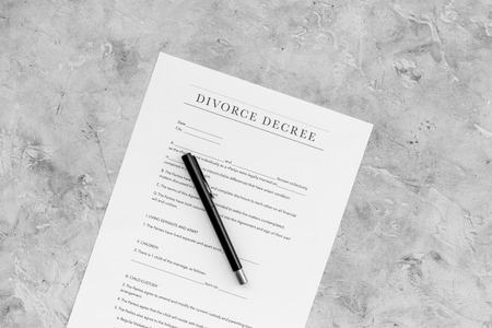 Divorce decree. Document on grey background top view copy spaceの写真素材