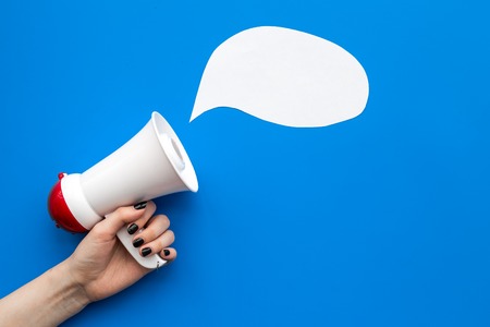 Statement concept. Megaphone near blank cloud for text on blue background top view copy space mockupの写真素材