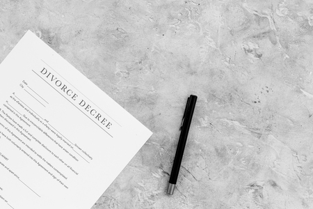 Divorce decree. Document on grey background top view copy spaceの写真素材