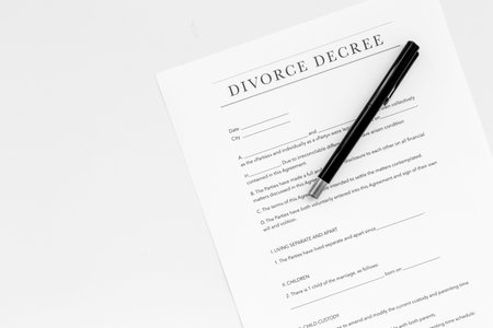 Divorce decree. Document on white backgroud top view.
