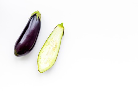 Layout of fresh sliced eggplant on white background top view copy spaceの写真素材