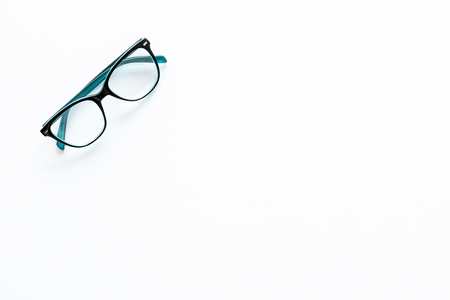 Glasses with transparent lenses on white background top view.の写真素材