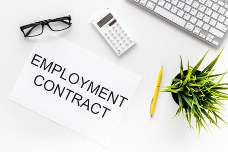 Recruitment concept. Words Employment contract on office desk with computer on white backround top...