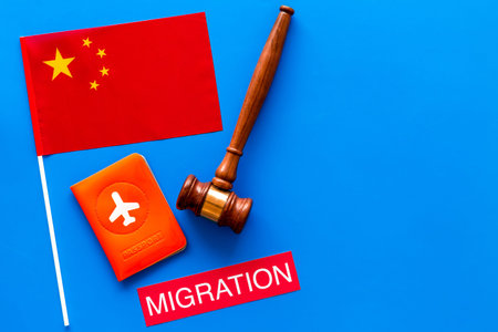 Visa to China concept. Text visa near passport cover and chinese flag. judge hammer on blue...