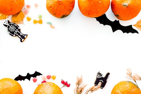 Halloween symbols. Pumpkins and cute figures of halloween evils. Bats. white background top viewの写真素材