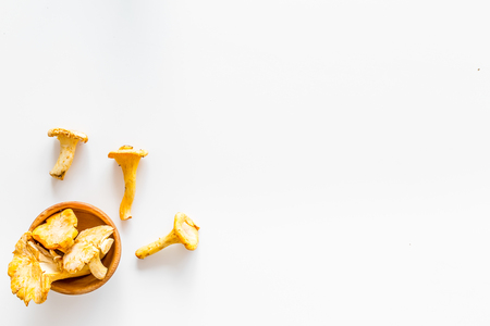 Chanterelle mushroom. Fresh raw chanterelles on white background top view.の写真素材