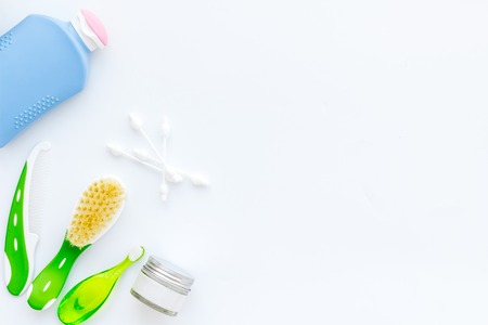 Childrens personal care kit. Bath accessories with teeth brush on white background top view copy spaceの写真素材