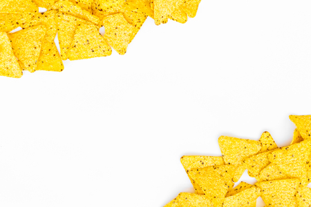 Nachos tortilla border on white backgroundの写真素材
