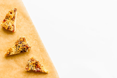Cook homemade cookies. Pattern with fresh cookies on baking paper on white background top view.