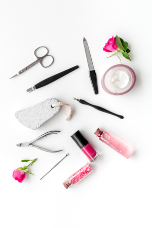 Manicure tools set for nail care on white desk background top view mock upの写真素材