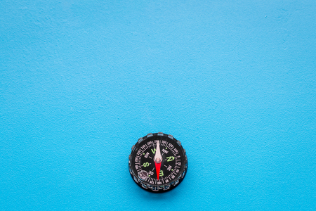 Direction of movement. Compass on blueの写真素材