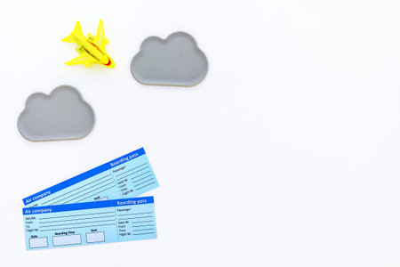 children tourism outfit with tickets and toys white background flat lay mockup