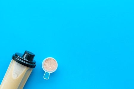 Sport diet with protein nutrition on blue background top view mock upの写真素材