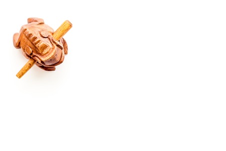 Buddhist symbol. Oriental wooden frog on white background top view.の写真素材