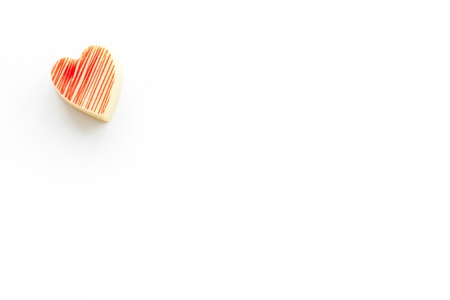 Heart-shaped confection for Valentine's day on white background top view.の写真素材