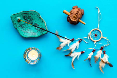 Buddhism attributes and symbols on blue background top viewの写真素材