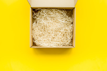 E-commerce. Delivery of goods that was purchased online. Empty cardboard box with cut paper on...