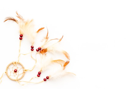 Asian attributes. Dream catcher on white background top view.の写真素材