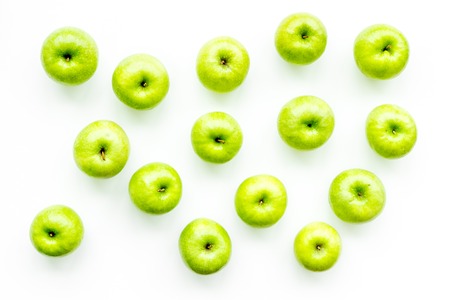 Food pattern with green apples on white background top view space for textの写真素材