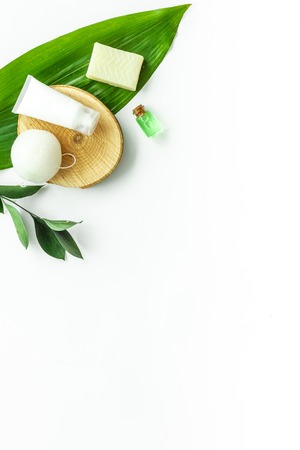 Herbal cosmetic set for homemade spa on white women desk background top view space for textの写真素材
