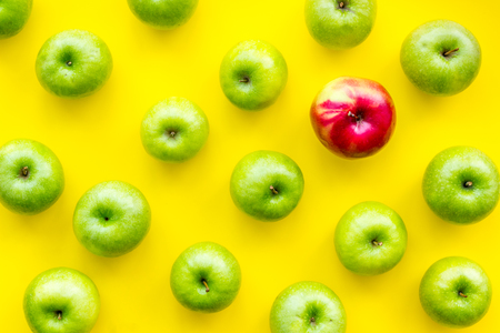 Green apples for organic summer food and fruit pattern on yellow background top viewの写真素材