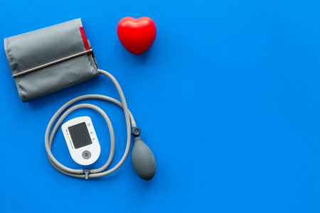 Diagnostics of cardiac disease with pulsimeter on blue background top view mockupの写真素材