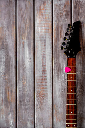 Music record studio with musician and DJ instruments on wooden background top view copyspace