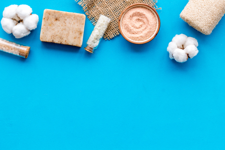 Organic cosmetics and eco-friendly materials for homemade natural spa and bath on blue background top view mock upの写真素材
