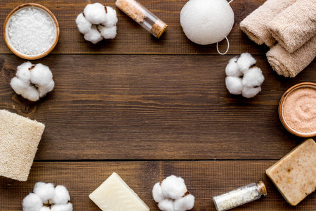 Zero waste set with cosmetics for spa and cotton eco-friendly materials on wooden background top view copyspaceの写真素材