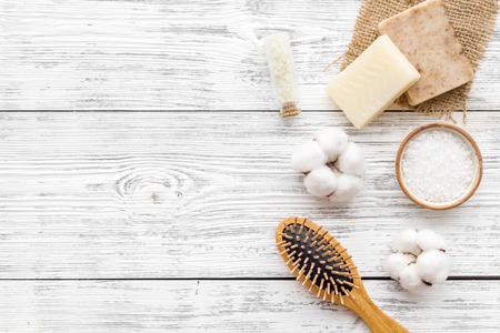 Organic cosmetics and eco-friendly materials for homemade natural spa and bath on white wooden background top view mock upの写真素材