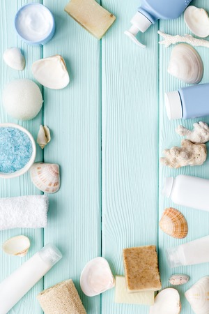 Skin care. Dead Sea cosmetics with natural ingredients on mint green wooden table background top view space for textの写真素材