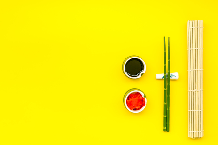Bamboo sticks, soy sauce, ginger for sushiの写真素材