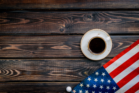 Memorial day of United States of America with flag and coffee on wooden background top view mock upの写真素材