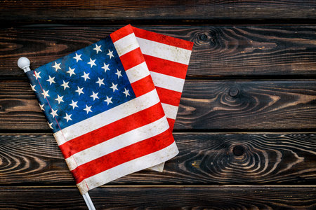 USA national day background with flag on wooden desk top view copy space