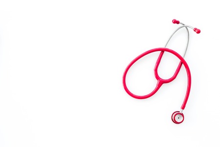 Stethoscope for family doctor set on white background top view space for textの写真素材