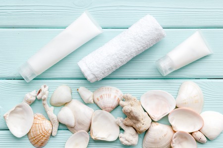 Homemade spa concept. Organic Dead Sea cosmetic set with cream and lotion on mint green wooden background top viewの写真素材