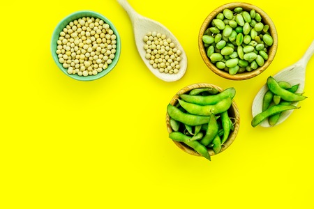 Sport diet food with green soybeans background on yellow desk top view mockupの写真素材