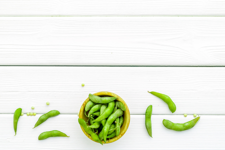 Healthy food. Edamame in bowl on white wooden background top view mock upの写真素材