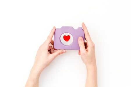 photo camera concept on white background top view.の写真素材