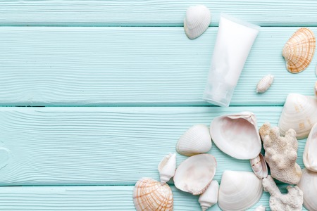 natural cream, lotion with Dead Sea minerals for homemade spa on mint green wooden table background top view mockupの写真素材
