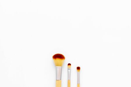 Instruments for make up with brushes on white background top view mock upの写真素材